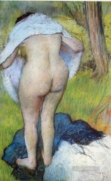Mujer desnuda poniéndose la ropa 1885 Edgar Degas Pinturas al óleo